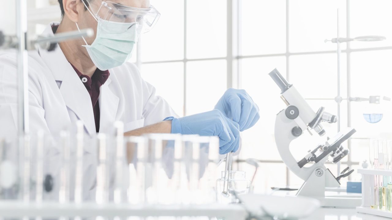 A,Male,Scientist,With,Black,Hair,Wearing,A,White,Coat
